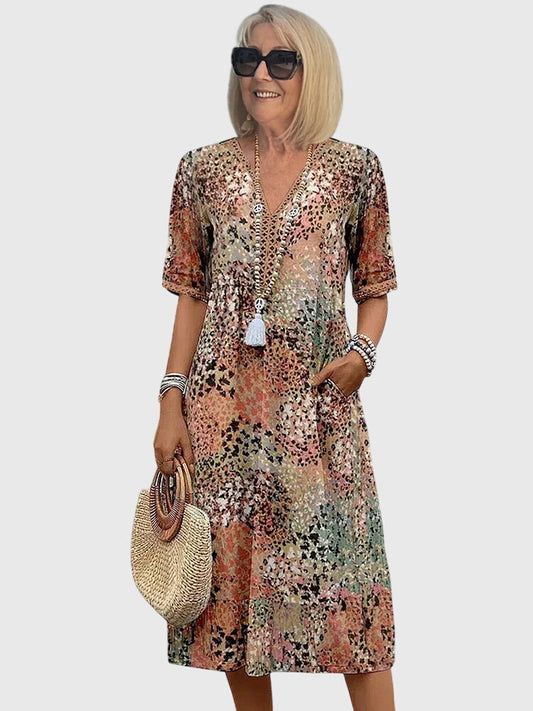 Robe midi fleurie sans manches à col en V pour femme
