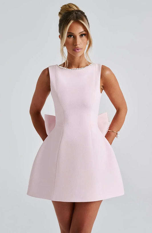 Robe courte femme sans manches avec nœud dans le dos