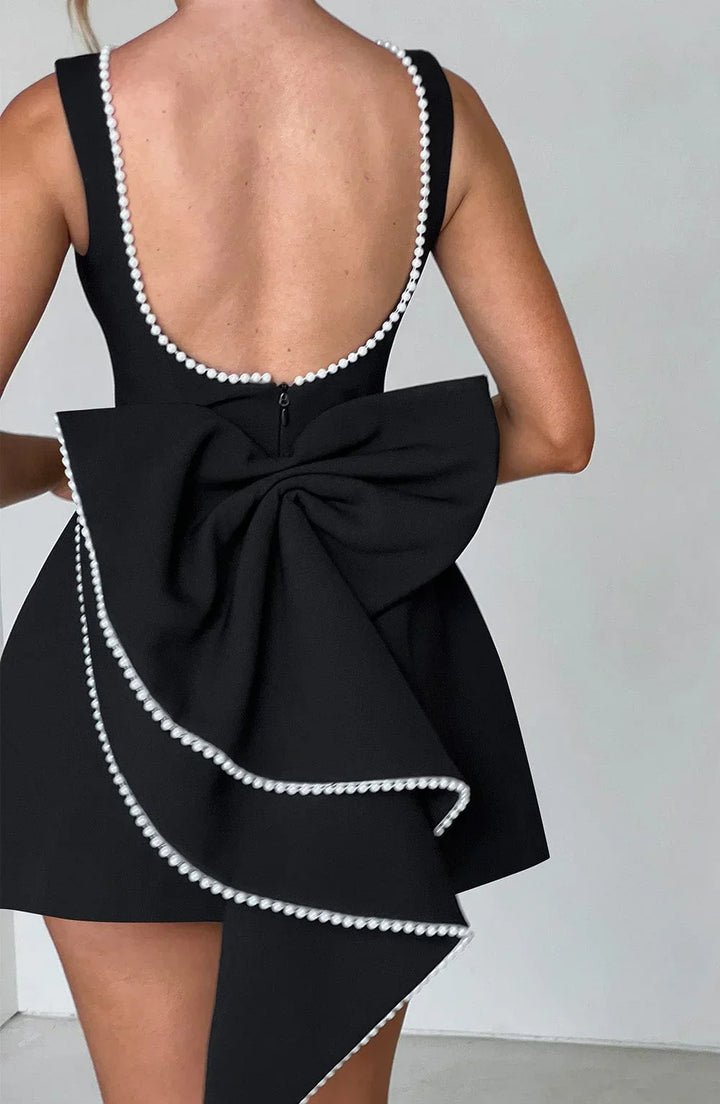 Robe courte femme sans manches avec nœud dans le dos